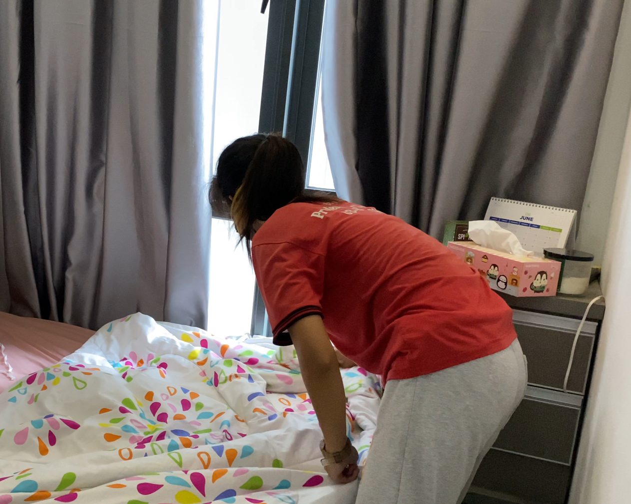 Ultra Cleaning specialist making a bed in a Petaling Jaya home