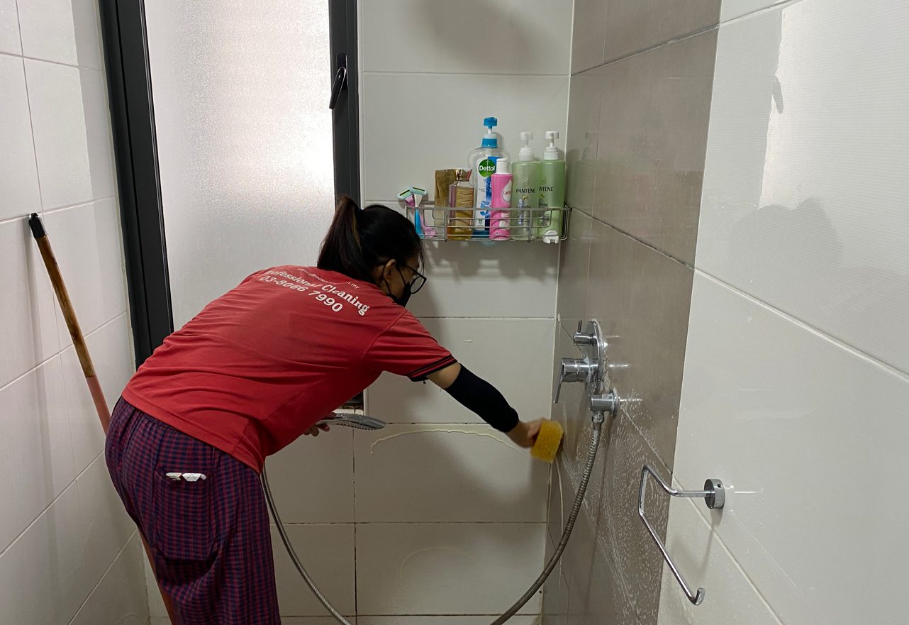 Ultra Cleaning specialist deep-cleaning a bathroom in Petaling Jaya